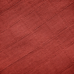 Fototapeta premium Fabric with geometric pattern in the form of a square of dark red color