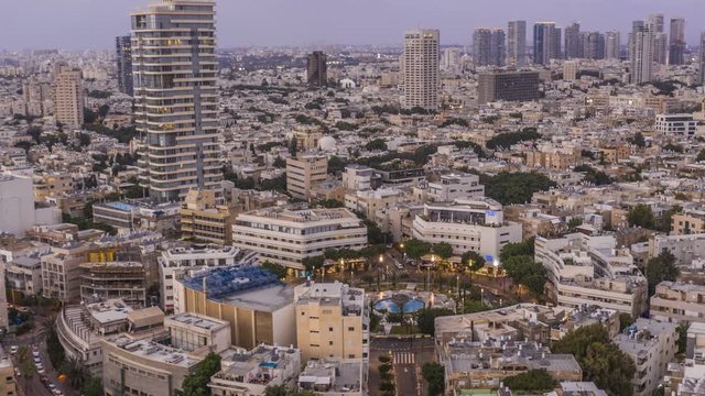 Big roundabout - Aerial hyperlapse - Dizengoff square in tel Aviv, Israel, at night, 4k drone view