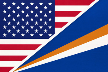 USA vs Marshall Islands national flag from textile. Relationship between american and Oceania countries.