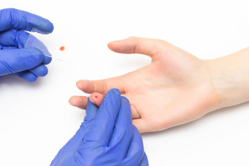 The doctor takes a biochemical blood test from a patient for a blood biopsy. New modern liquid...