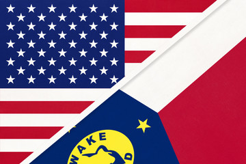 Obraz premium USA vs Wake Island national flag from textile. Relationship between american and Oceania countries.