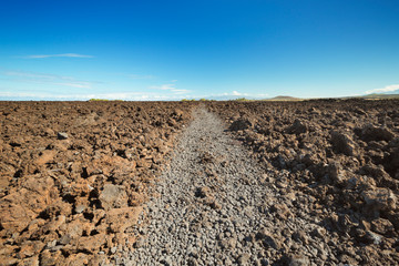 Walking trail through lava fields in Hawaii, USA