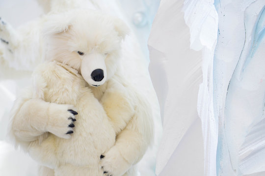 Mother and son bears hugging