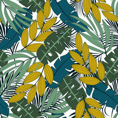 Summer seamless tropical pattern with bright yellow and blue plants and leaves on white background. Seamless pattern with colorful leaves and plants. Tropic leaves in bright colors.
