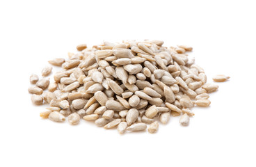 Peeled Sunflower seeds isolated on white background