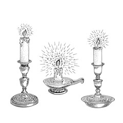 Candle sketch. A set of different candles in an old candlestick. Hand drawn vector illustration