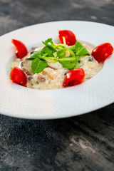 risotto with fresh cream, salted chicken, rehydrated ceps and mushrooms