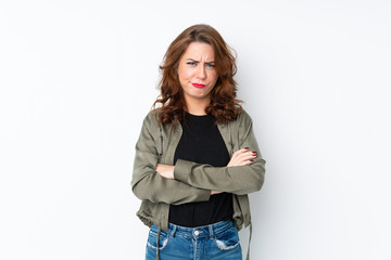 Fototapeta premium Young Russian woman over isolated white background feeling upset