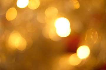Fototapeta premium Gold blur abstract background. bokeh christmas blurred beautiful shiny Christmas lights, Christmas background concept..