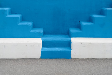 Selective view of the outdoor staircase with blue background. Minimalist concept.
