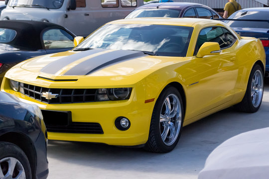 Chevrolet Camaro yellow with black stripes