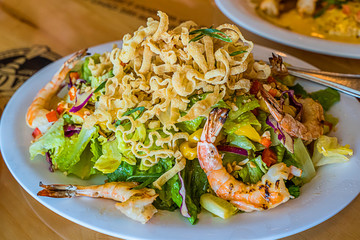 Reproduce fresh prawn salad in a hilltop restaurant on the popular viewpoint of The Peak Hong Kong. Taken from a real location.