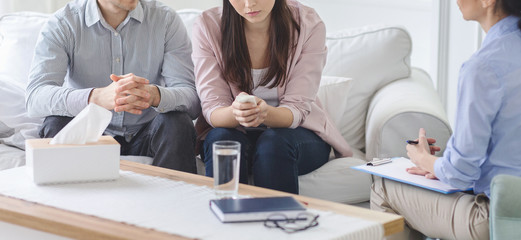 Cropped photo of couple visiting marital therapist