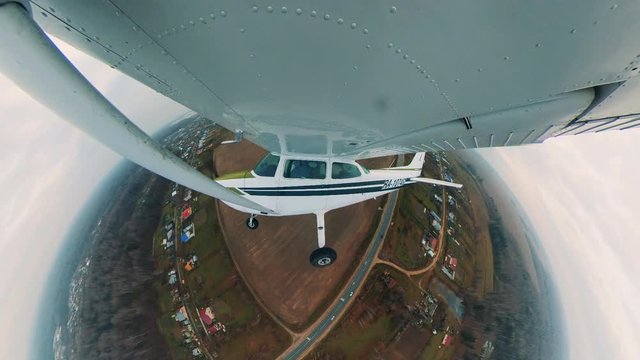 A light aircraft flying low.