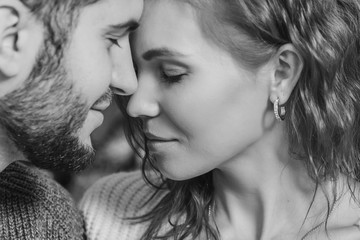 beautiful couple in love close up. intimacy between a man and a woman. the concept of the...