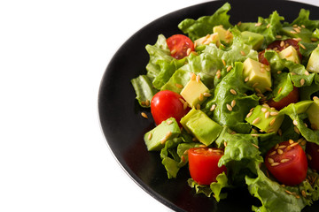 Salad with avocado, lettuce, tomato, flax seeds isolated on white background