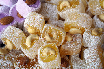 Arabic traditional dessert rahat lokum. Turkish sweets.. Candy in the market