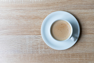 Coffee in white cup on wooden background, Breakfast concept
