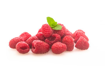 Fresh raspberries on a white background