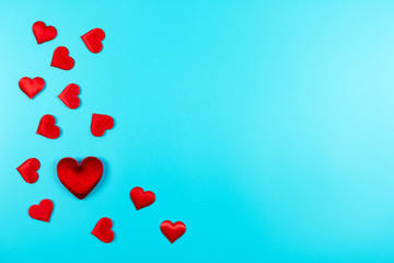 Love and Valentine's day concept., Decoration red hearts on light blue background with copy space for text.