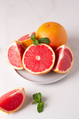 fresh citrus fruits on white background
