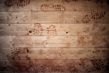 Wooden surface with footprints on it - great for background or a blog
