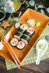 sushi with salmon and avocado. Sushi roll with salmon and tempura shrimp