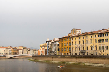 Day view over Arno river in Pisa, Tuscany, Italy