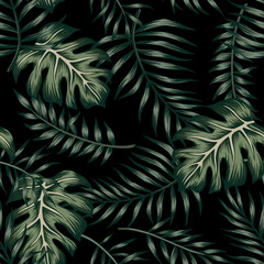 Tropical vector palm leaves seamless pattern black background. Exotic jungle wallpaper.