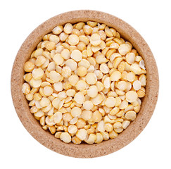 Pea seeds on a plate on a white background