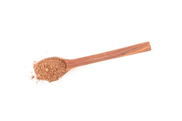 Wooden spoon with cocoa powder isolated on white background