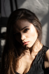 Close up of young beautiful dark-haired girl