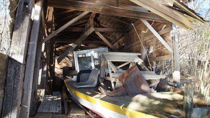 Broken boat hut on the lakeside