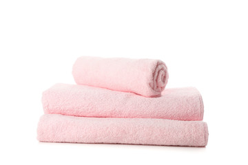 Fototapeta na wymiar Folded fresh pink towels isolated on white background