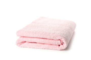 Obraz na płótnie Canvas Folded pink towel isolated on white background, close up