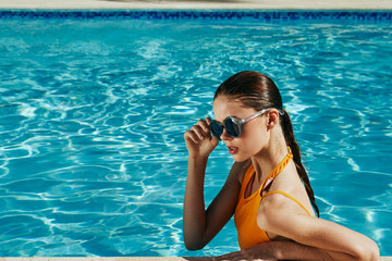 young woman in swimming pool