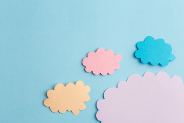 beautiful blue background with light clouds of paper