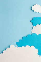beautiful blue background with light clouds of paper