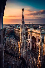 Gordijnen Milaan Duomo Italië uitzicht vanaf het dakterras bij zonsondergang © UMB-O