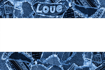 Denim jeans ripped fabric patches.  Destroyed Torn Denim Frame in trendy classic blue color, copy space. Recycling denim jeans cloth consept