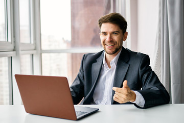 Fototapeta premium businessman working on his laptop in an office