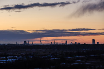 Fototapeta premium dramatic winter sunrise over city of Riga in Latvia