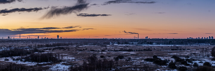 dramatic winter sunrise over city of Riga in Latvia