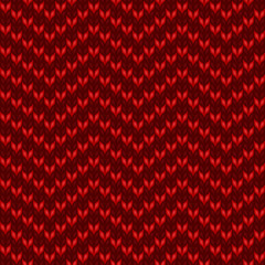 Seamless knitted striped shevron zigzag red pattern. Christmas backgroung