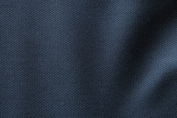 Close up shot of midnight dark blue formal suit cloth textile surface. wool fabric texture for...