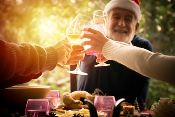 Christmas party cheerful family and  drink.Celebrating New Year.  