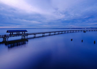 Fototapeta na wymiar Blue Sunset with Ocean Walkway in Bellingham, Washington