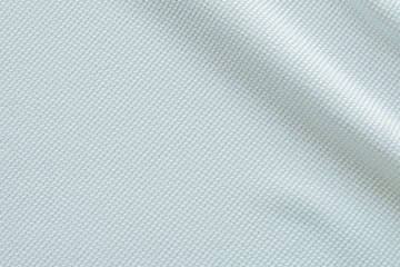 White grey fabric close up shot of Cotton and polyester Polo shirt. Casual wear over the weekend or summer time season. Background texture concept with copy space for text.