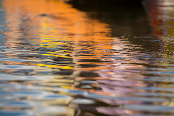 Colourful reflection of a houseboat in  Dal lake,Srinagar,Kashmir,India