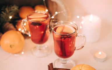 Atmospheric Christmas or New Year background with mulled wine. Close up of mulled wine, soft focus, shallow depth of field